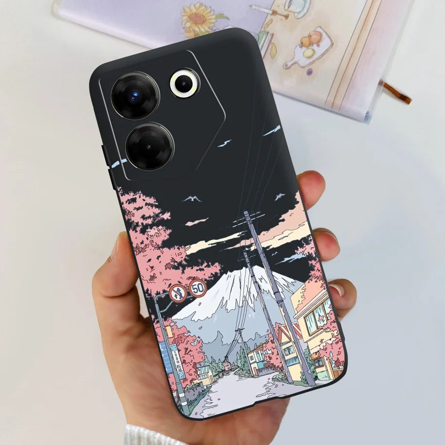 Phone case with a scenic design held by a hand on a light background