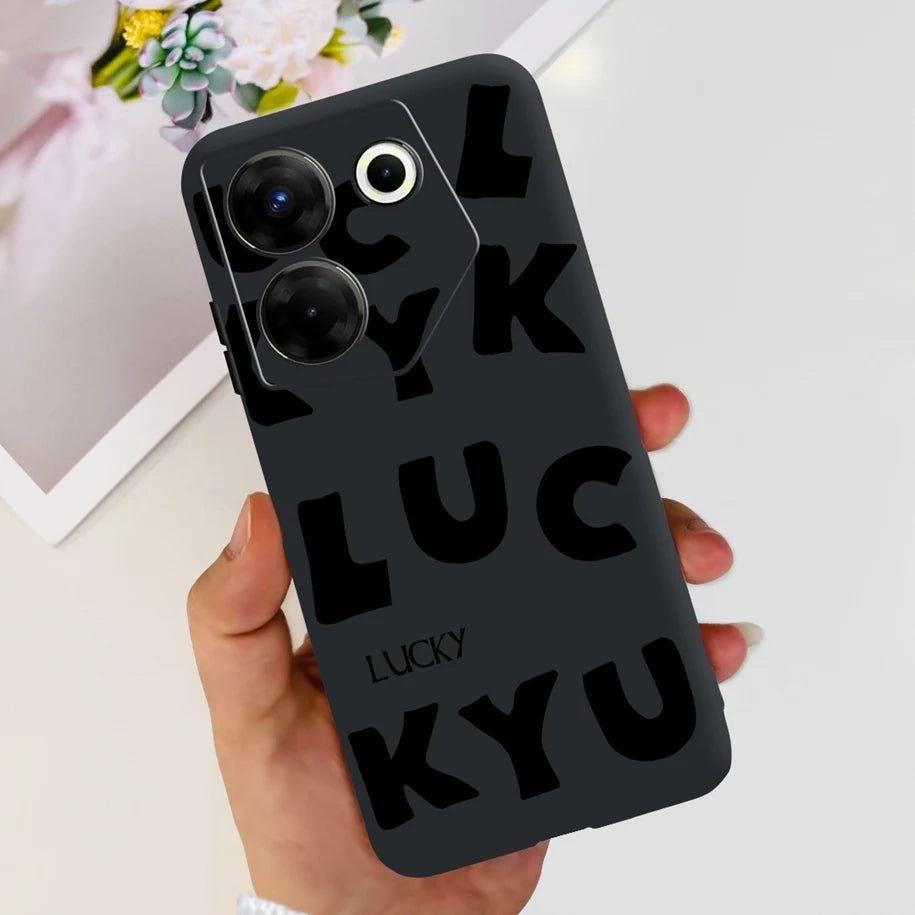 Black phone case with 'LUCKY' text held by a hand on a light background