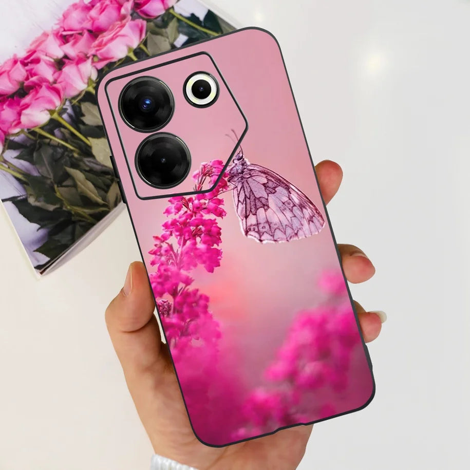 Pink Samsung case with cherry blossom and butterfly design, shown in hand.